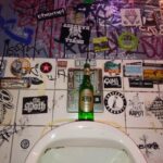 Local Band Confused Why Album Isn’t Selling Despite Placing Sticker on Bar Urinal