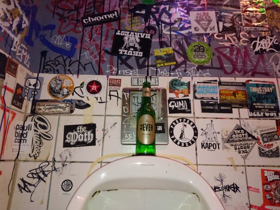 Local Band Confused Why Album Isn’t Selling Despite Placing Sticker on Bar Urinal